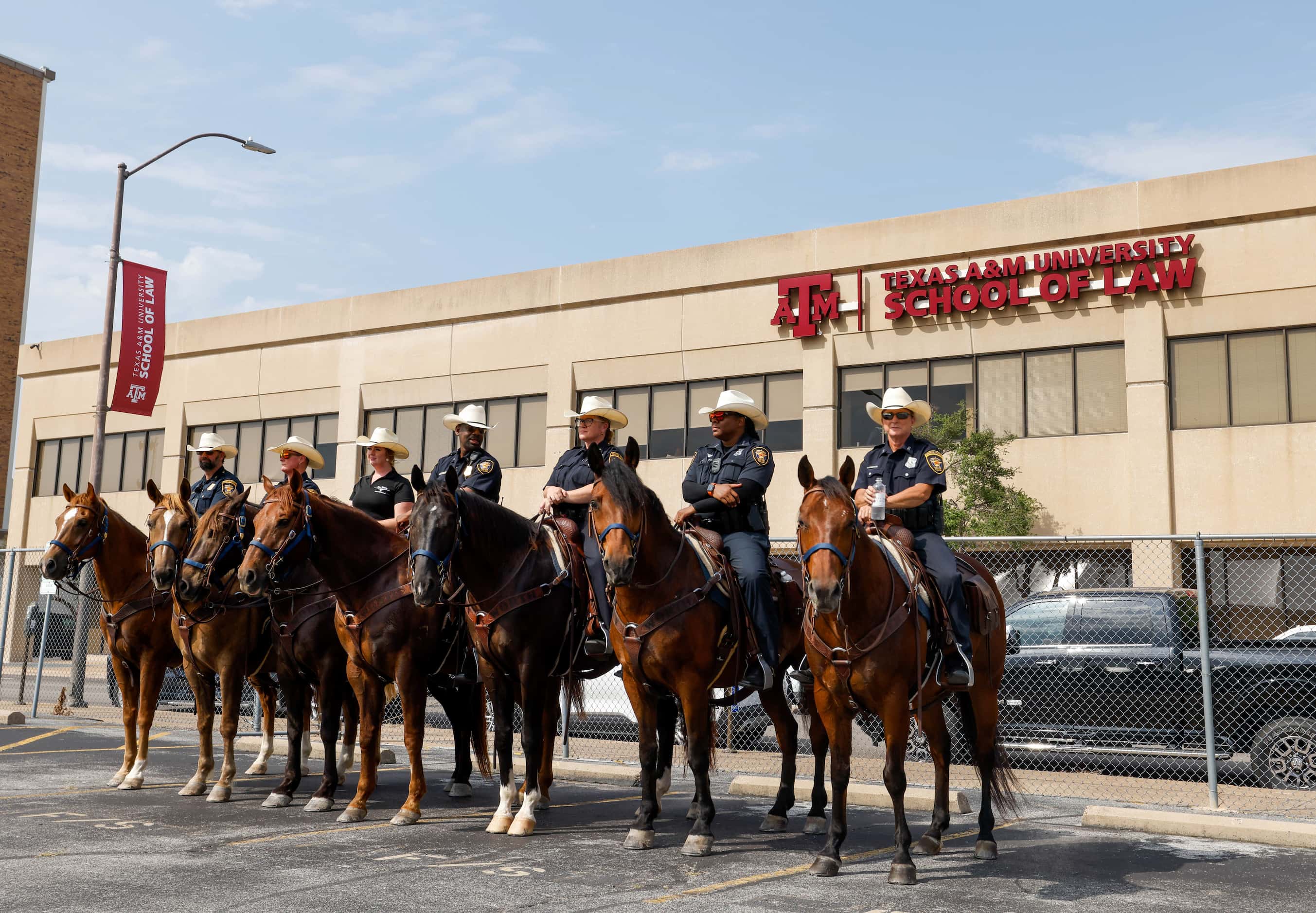The Fort Worth Police Department Mounted Patrol stands by a groundbreaking ceremony for...