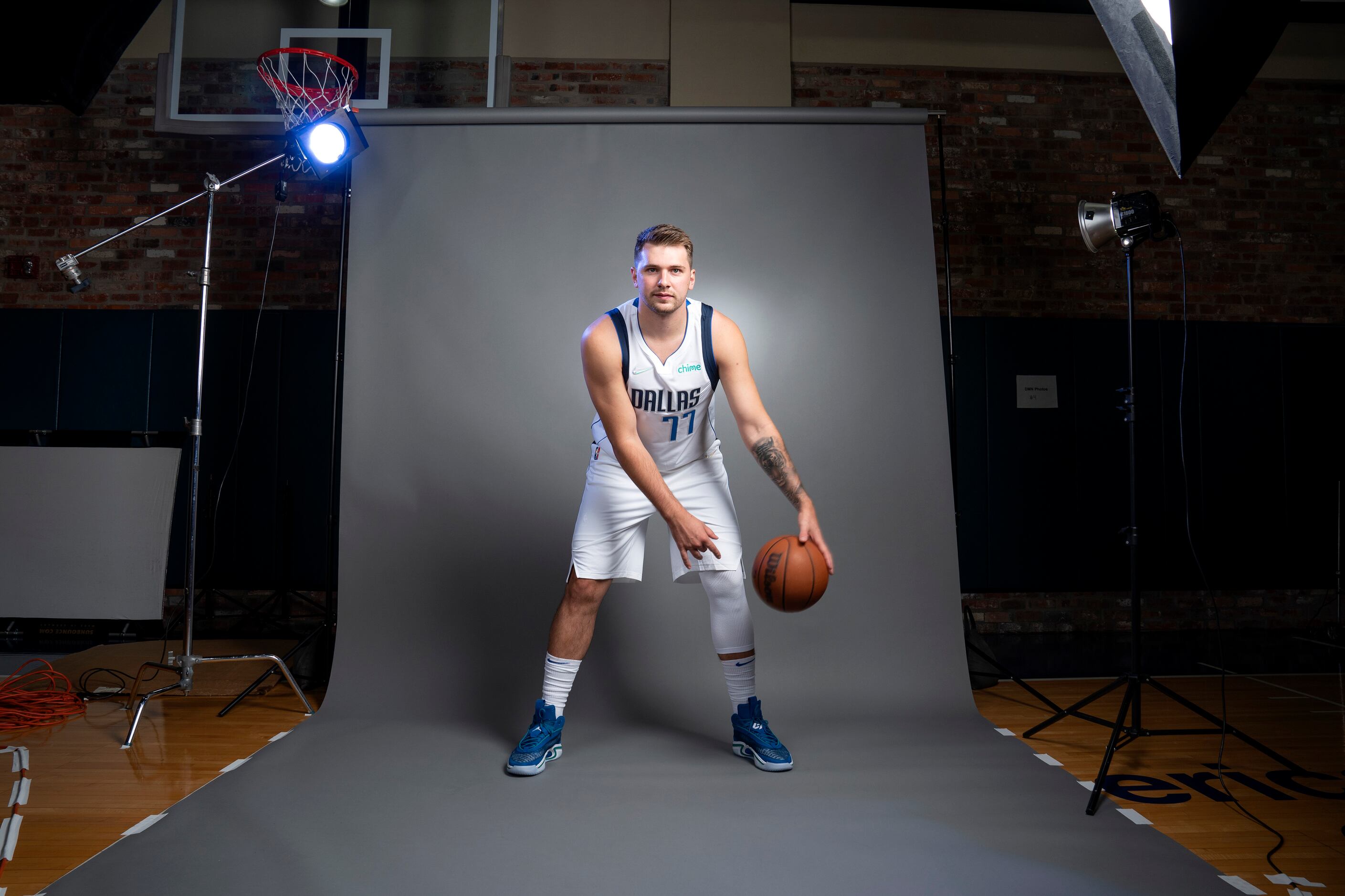 Luka Doncic poses for a portrait after being drafted by the Dallas