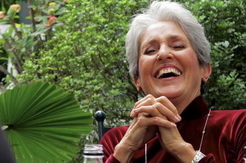 In this April 6, 2013 photo, Joan Baez laughs while speaking to former staff at the...