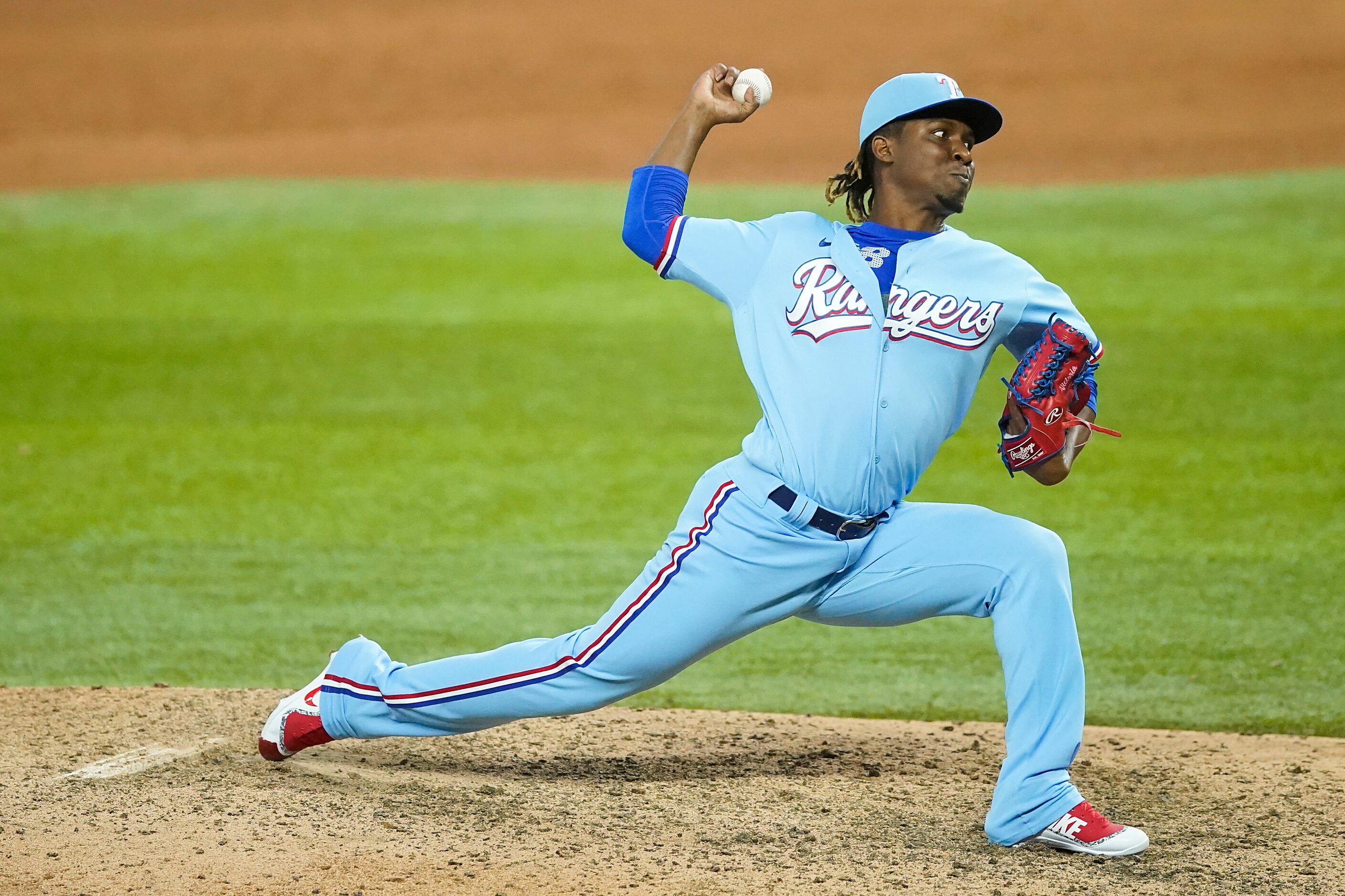 Texas Rangers pitcher Rafael Montero delivers during the ninth inning against the Houston...