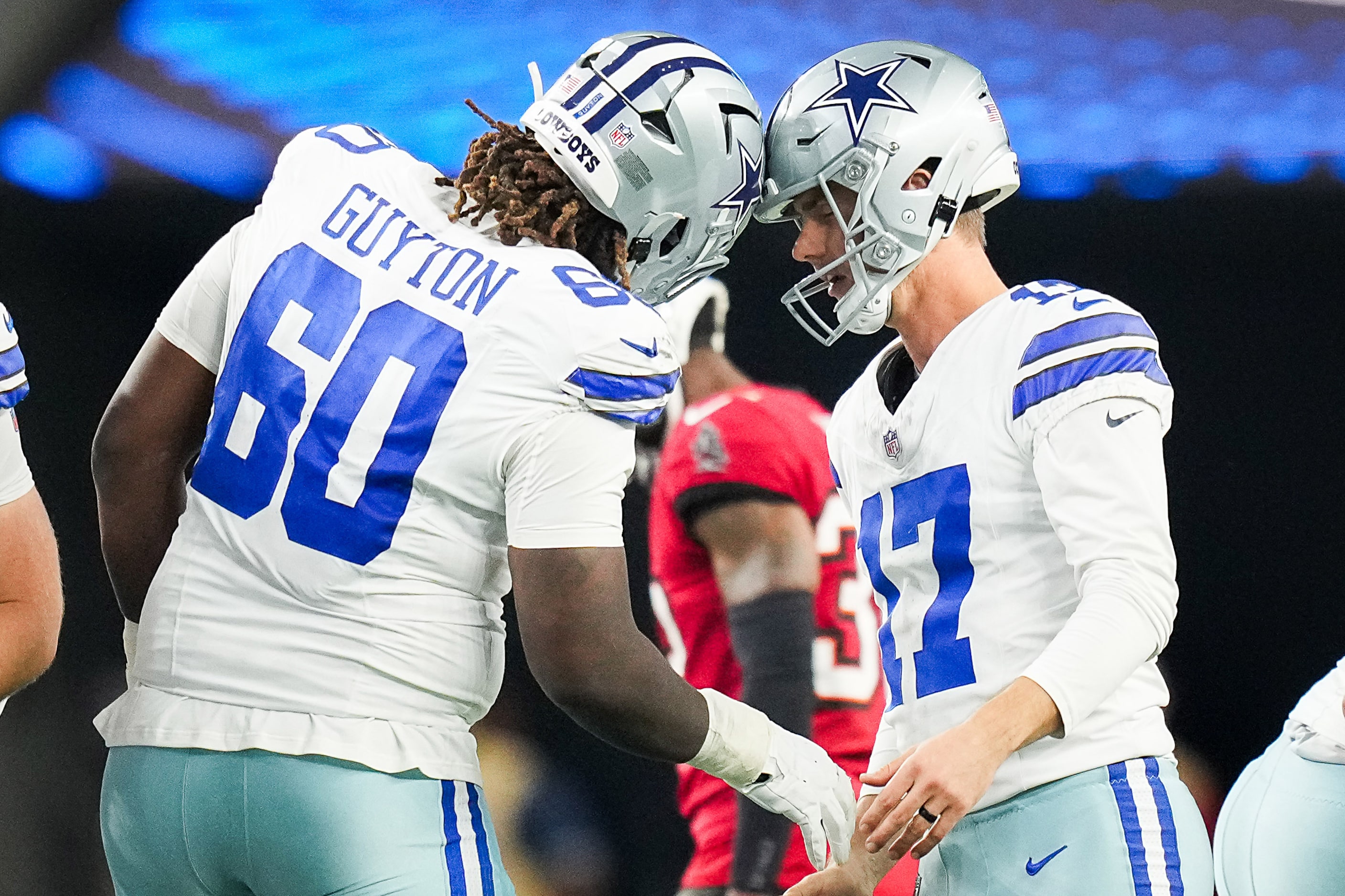 Dallas Cowboys place kicker Brandon Aubrey (17) celebrates with offensive tackle Tyler...