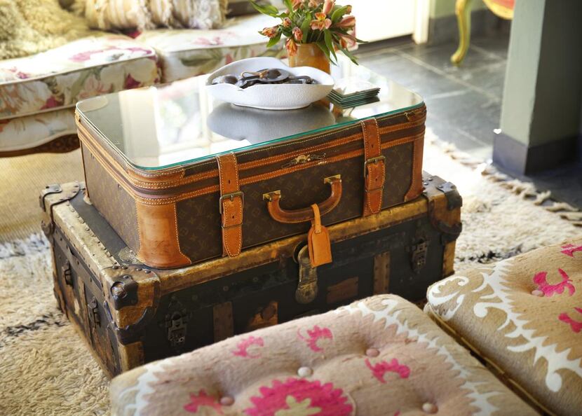 
By stacking vintage luggage pieces, Brittany Cobb created a coffee table for the sunroom in...