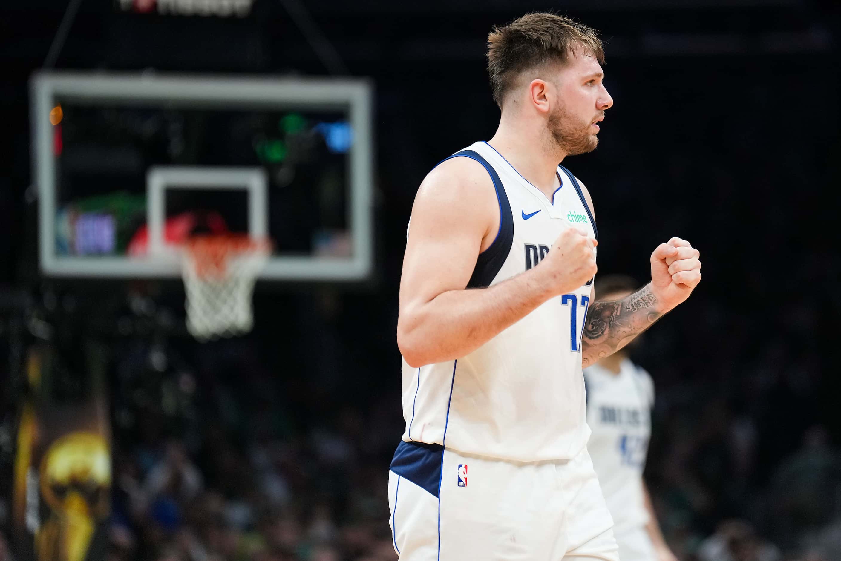 Dallas Mavericks guard Luka Doncic celebrates after a basket during the first half in Game 2...