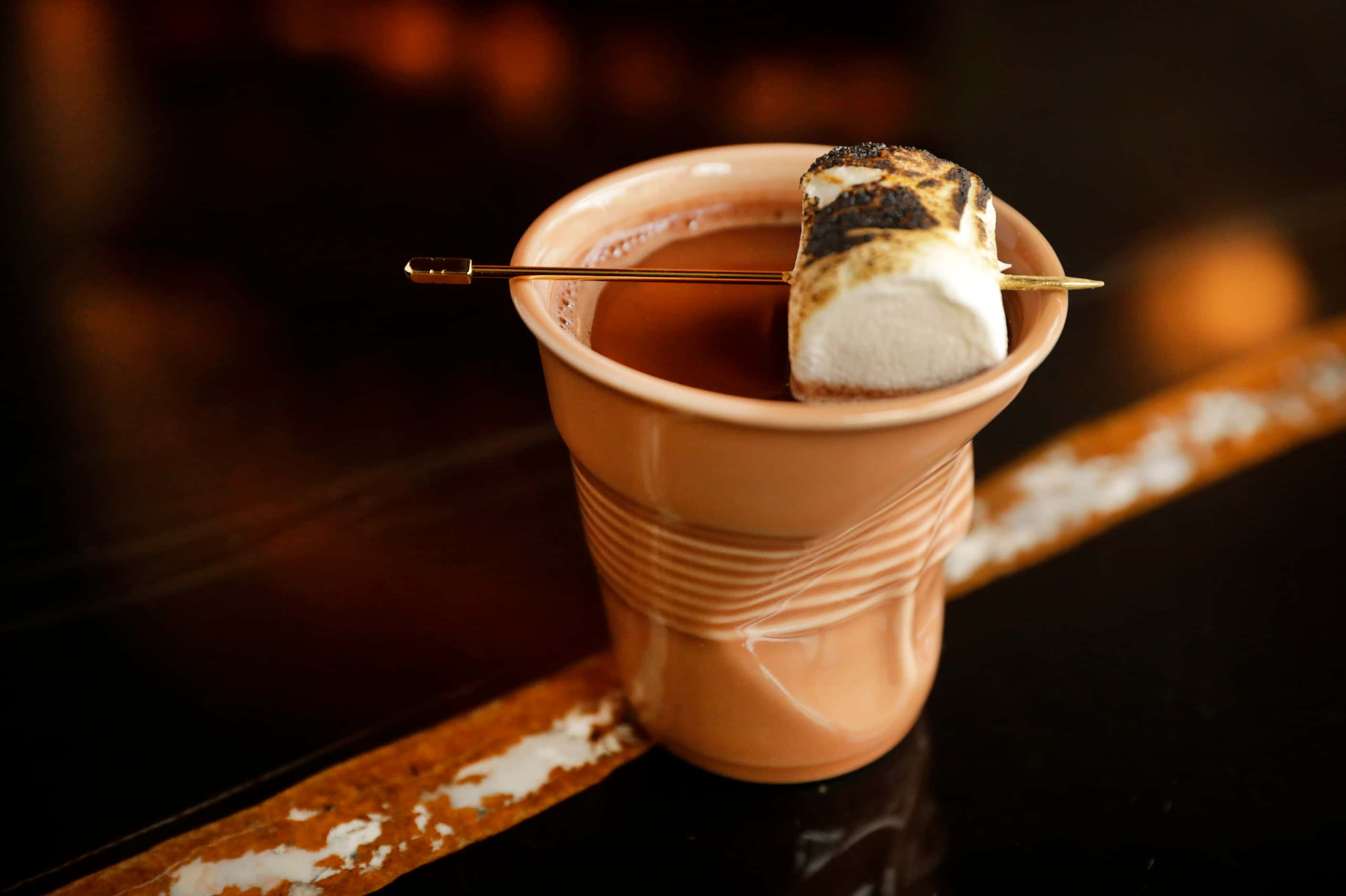 The Chamonix hot chocolate cocktail is made with monk-inspired, in-house chartreuse at Bar...