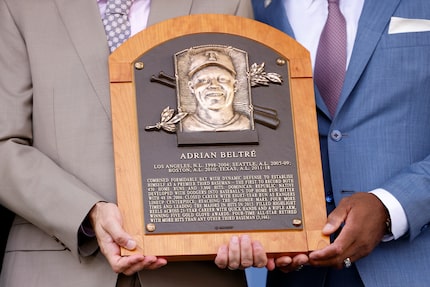 Former Texas Rangers third baseman Adrián Beltré holds his National Baseball Hall of Fame...