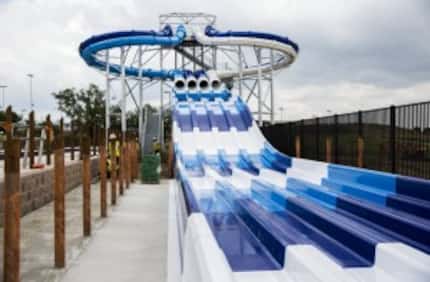  The Preston Plunge at the Frisco Athletic Center is a 45-foot tall, four-lane mat racer slide.