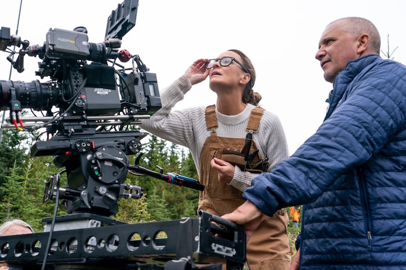 This image released by Focus Features shows actor-director Robin Wright (left) and and...