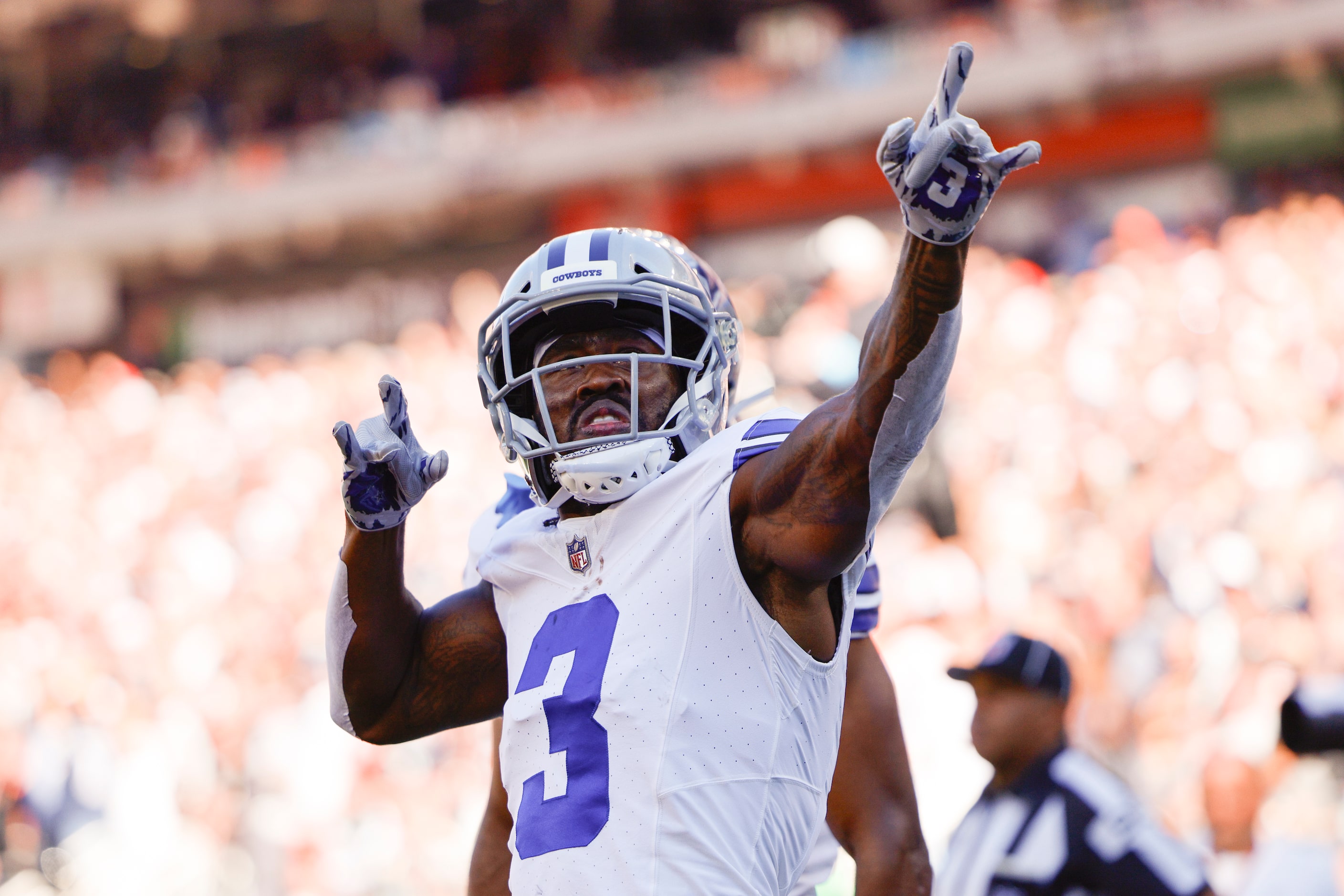 Dallas Cowboys wide receiver Brandin Cooks (3) celebrates after catching a pass from...