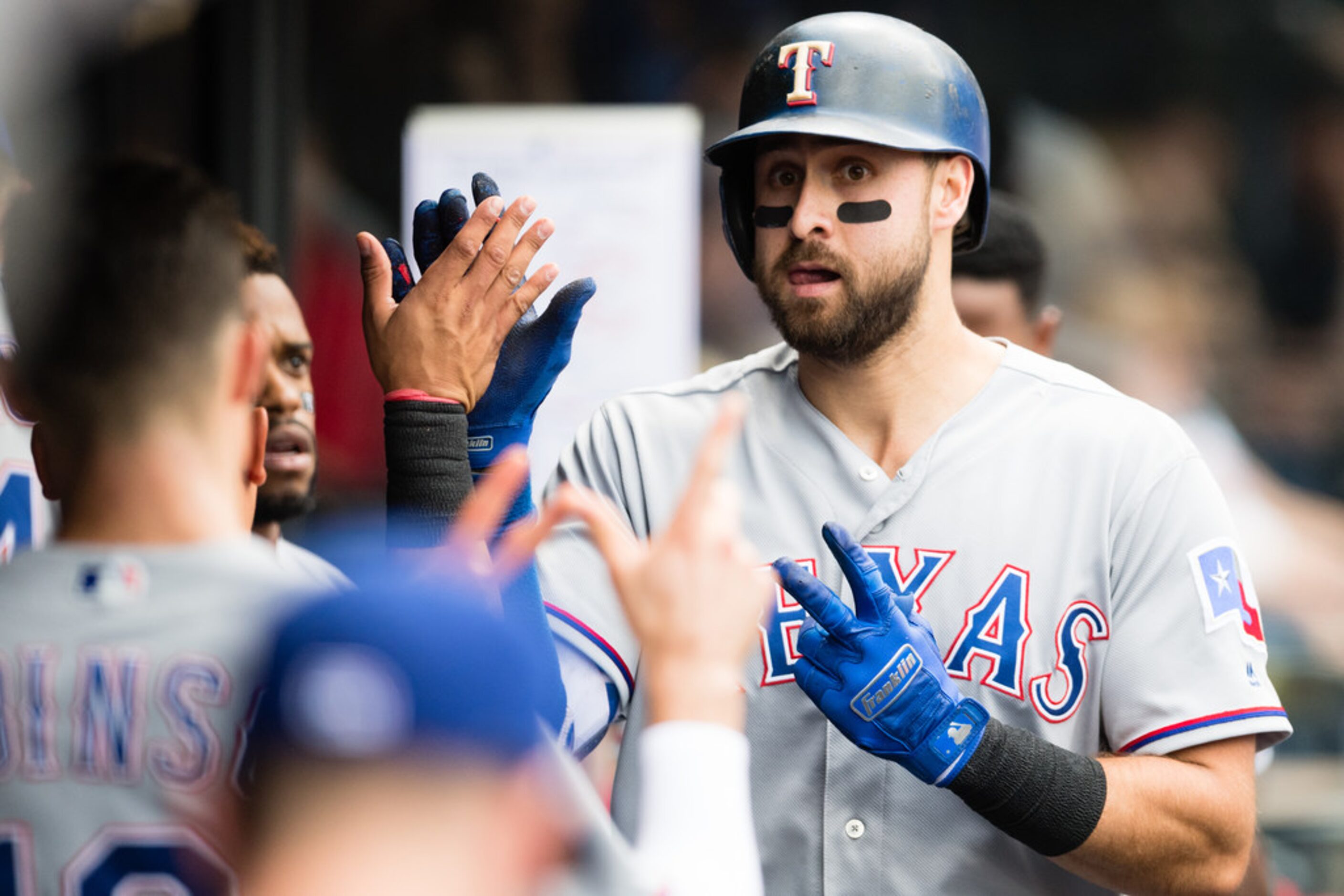 CLEVELAND, OH - MAY 2: Joey Gallo #13 of the Texas Rangers celebrates after hitting a solo...