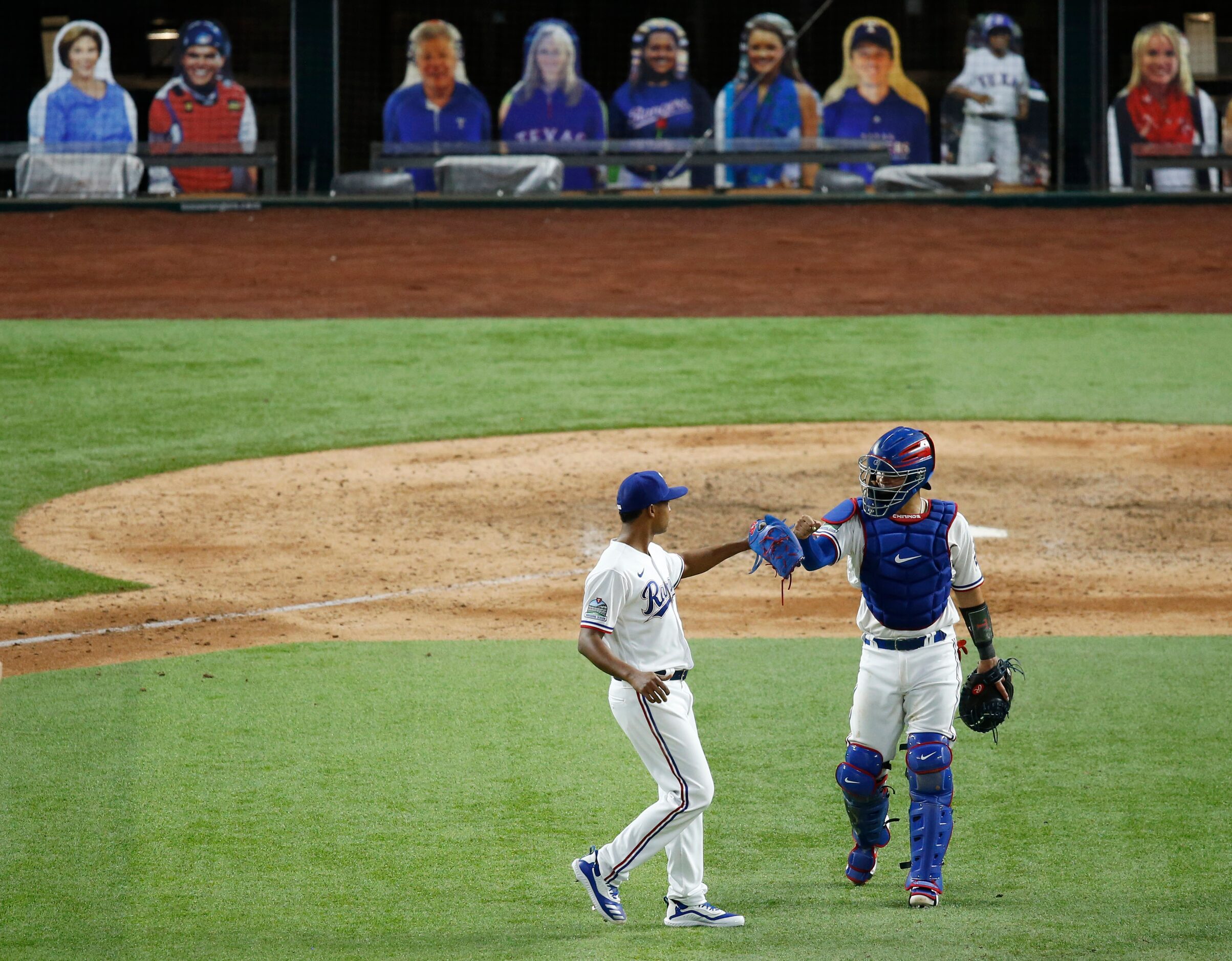 Texas Rangers relief pitcher Jose Leclerc (25) and Texas Rangers catcher Robinson Chirinos...