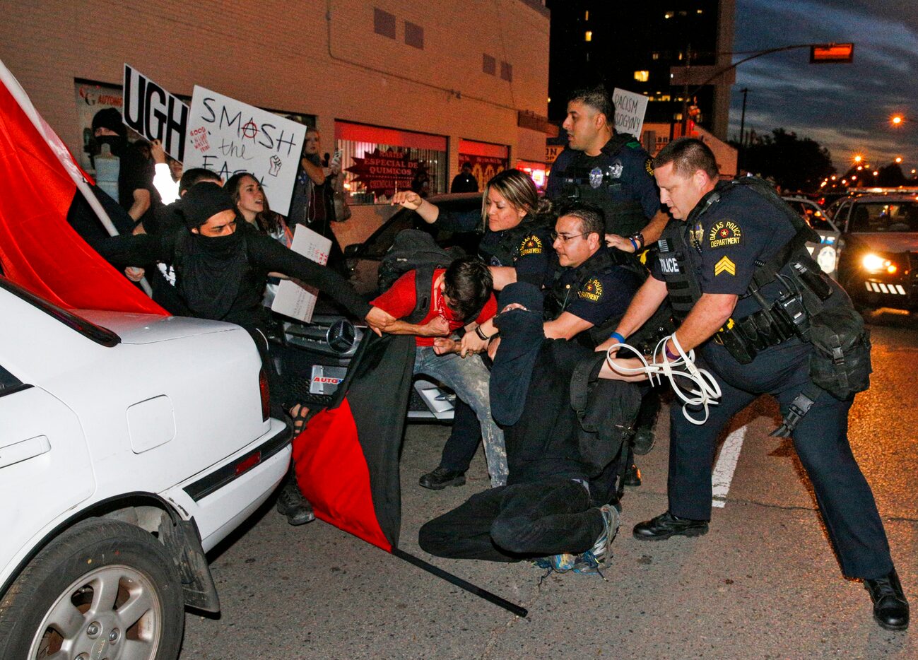 A protester is arrested during the J20 Dallas Anti Trump March & General Strike on Bishop...