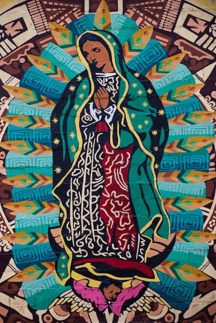 A mural of Our Lady of Guadalupe by Steve Hunter in the Bishop Arts district, on Dec. 05,...