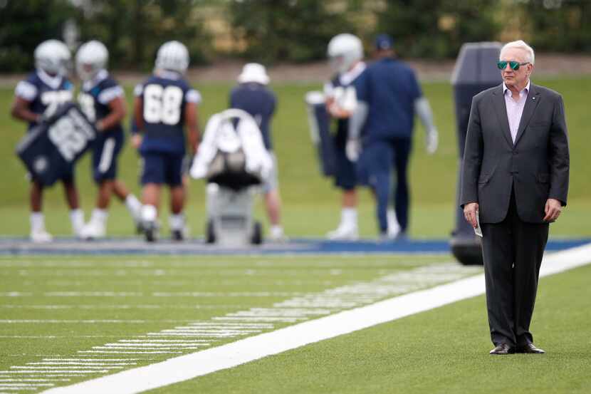 Dallas Cowboys owner and general manager Jerry Jones watches rookie minicamp from the...