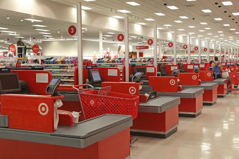 File photo -- The checkout lanes in a Target store remodeled two years ago at Coit and...