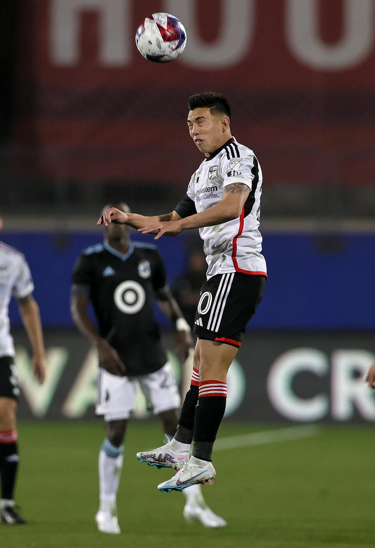 FC Dallas attacker Alan Velasco heads the ball against Minnesota United during the second...