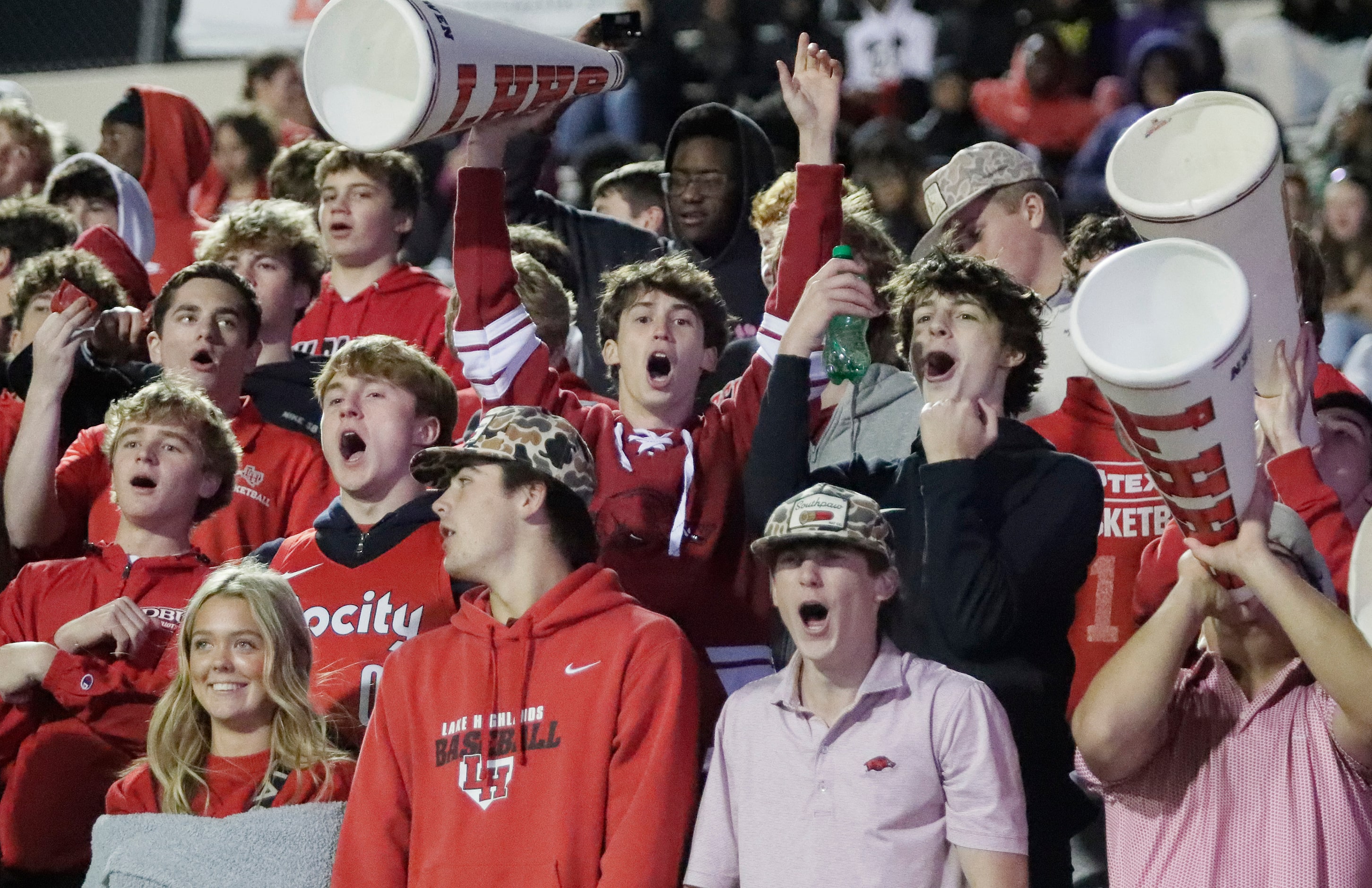 Lake Highlands High School students cheer a touchdown during the second half as Lake...