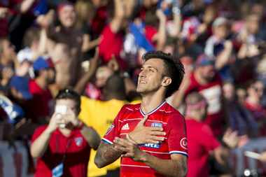 FC Dallas forward Maximiliano Urruti (37) celebrates on the sideline after scoring a goal...