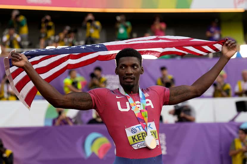 Fred Kerley, of the United States, celebrates after wining the final in the men's 100-meter...