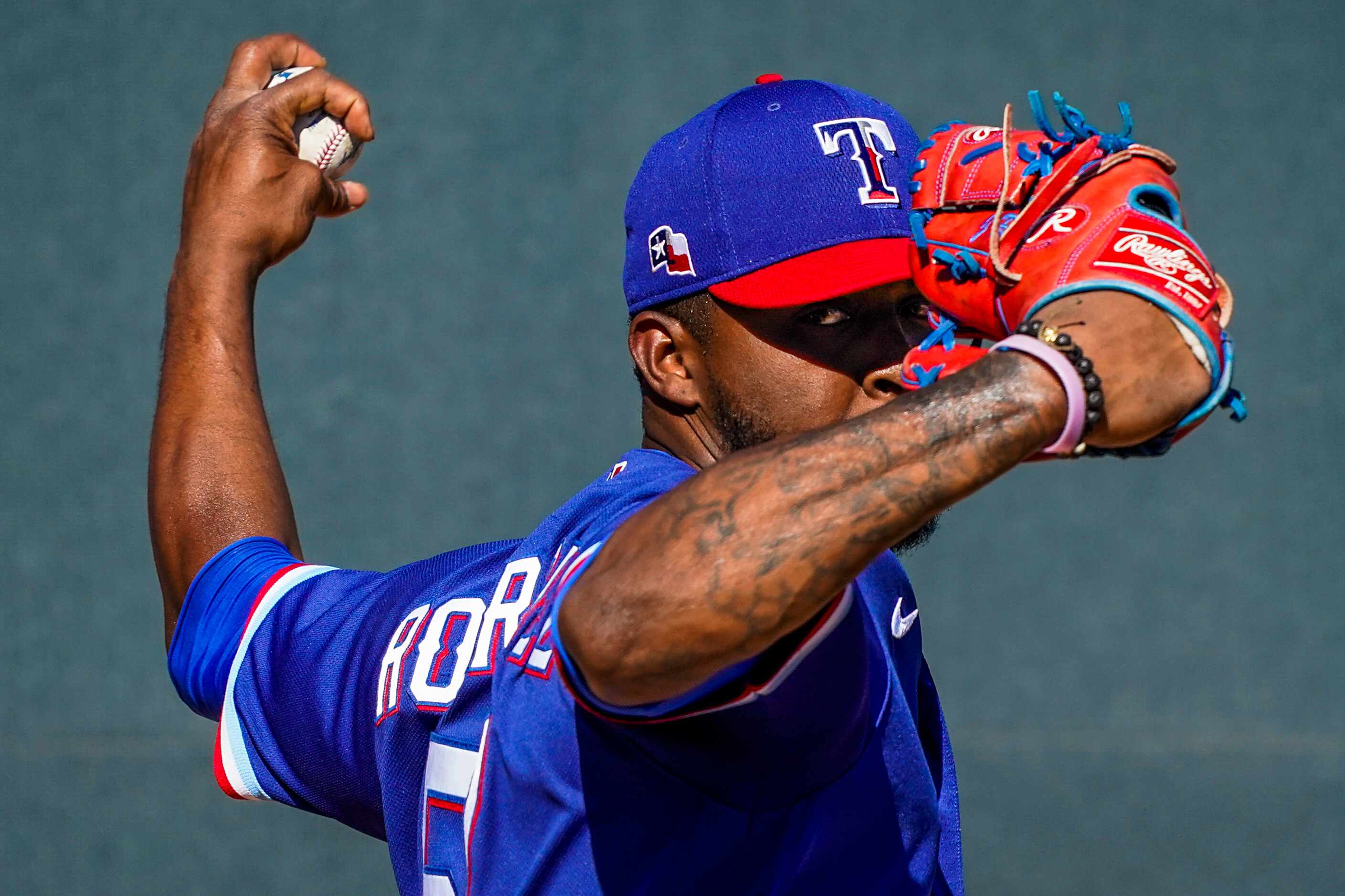 Texas Rangers pitcher Joely Rodriguez warms up in the bullpen during the sixth inning of a...