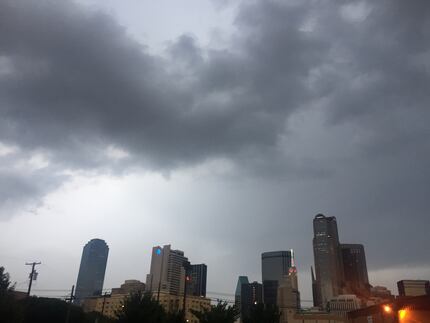 Clouds gathered over the downtown Dallas skyline Friday morning.