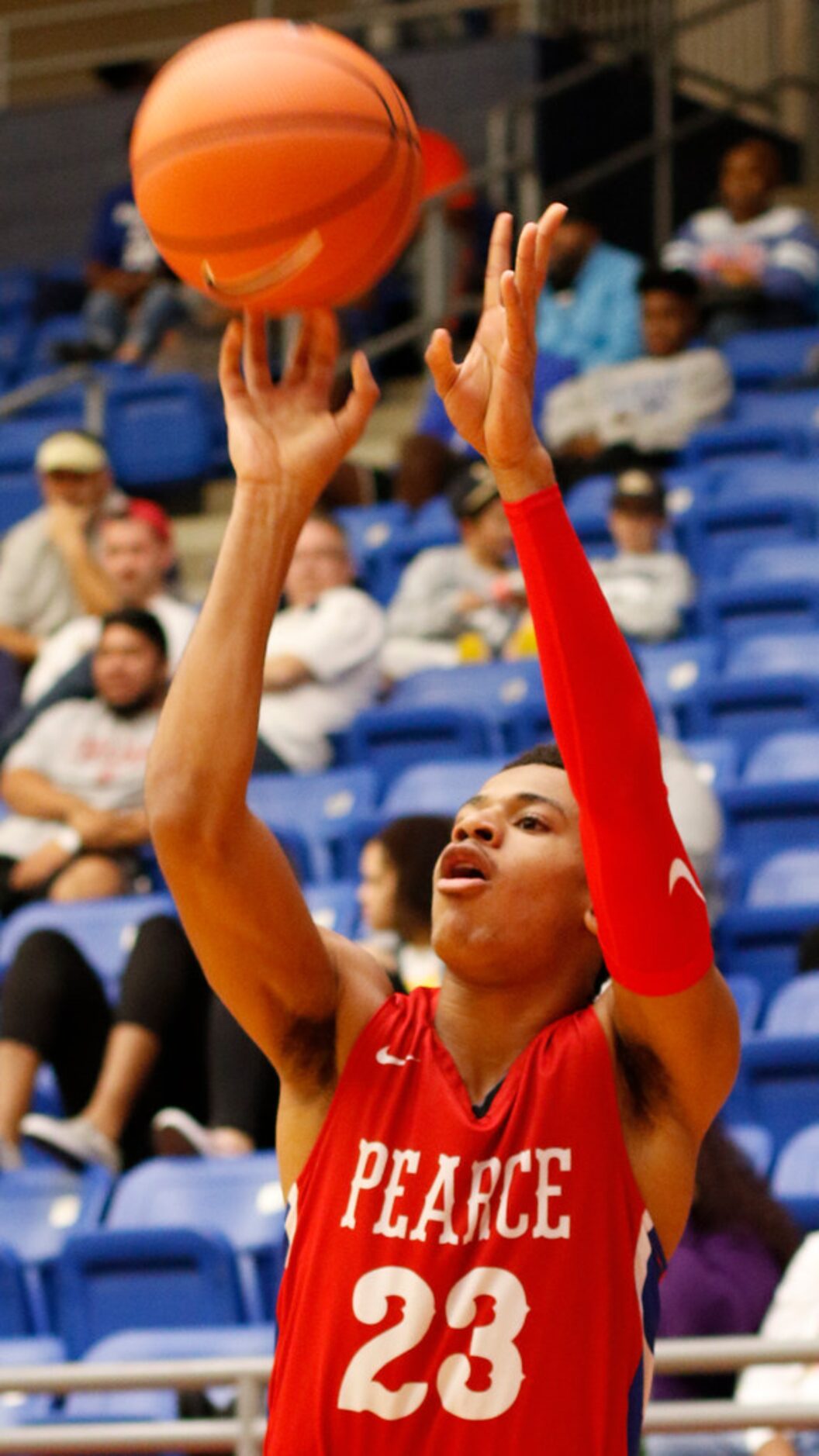 Richardson JJ Pearce guard Sterling Hopkins (23) sinks a shot during first quarter action...