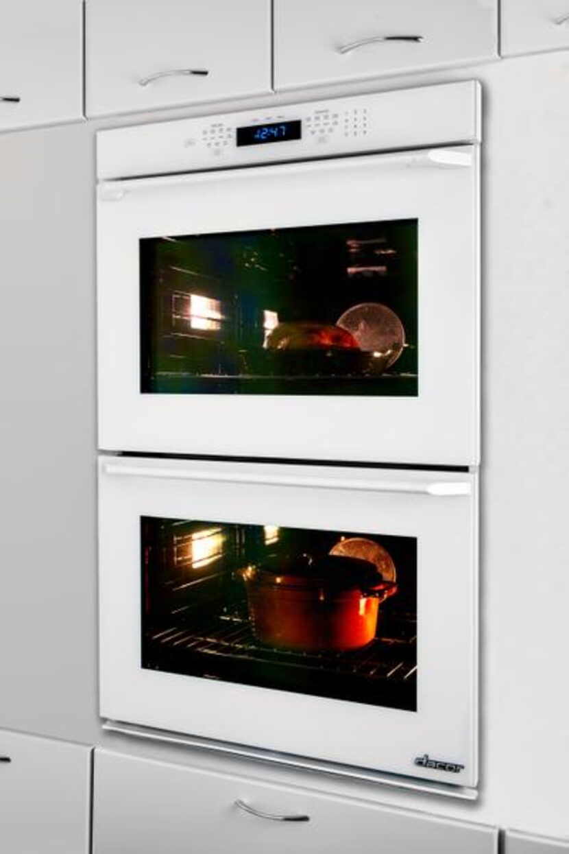 
Snow white: Adding a contrast to colorful cabinetry is the Renaissance 30-inch wall oven in...