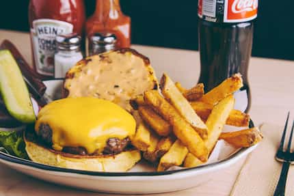 The All-American burger is the top seller at all Black Tap Craft Burgers & Beer restaurants...
