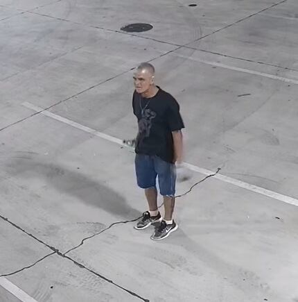 Surveillance footage shows one of two people police are seeking in connection with a...