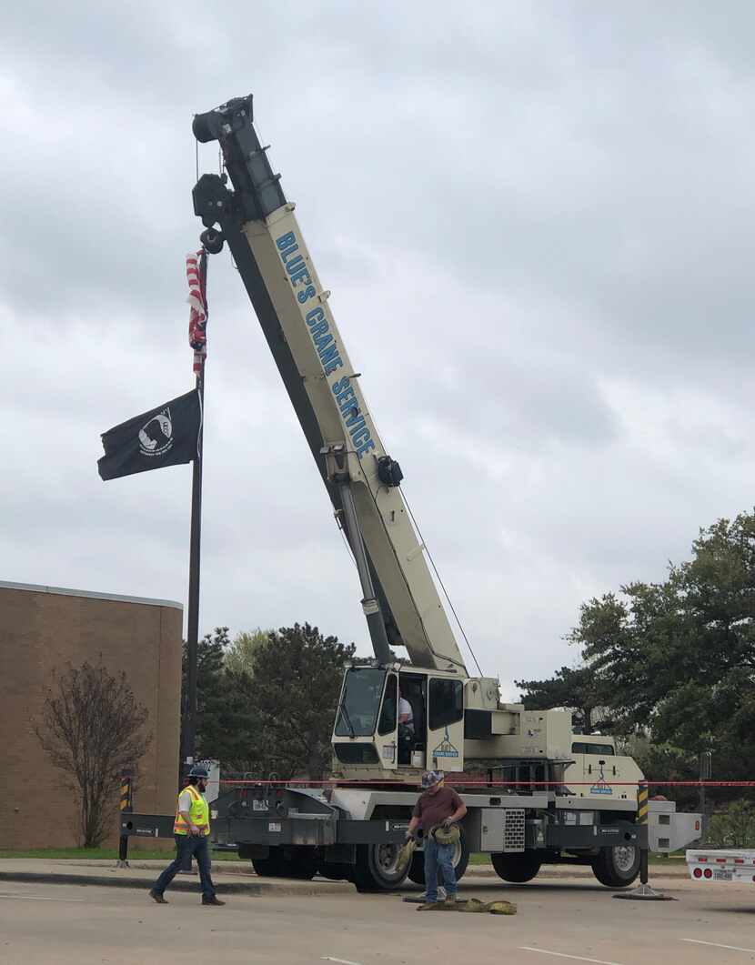 When Lisa Neidinger a 23-year Army veteran, saw a crane pull up near the flagpole with the...