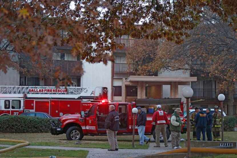
Emergency responders surveyed the scene of a fire Wednesday at the Gatewood Apartments.
