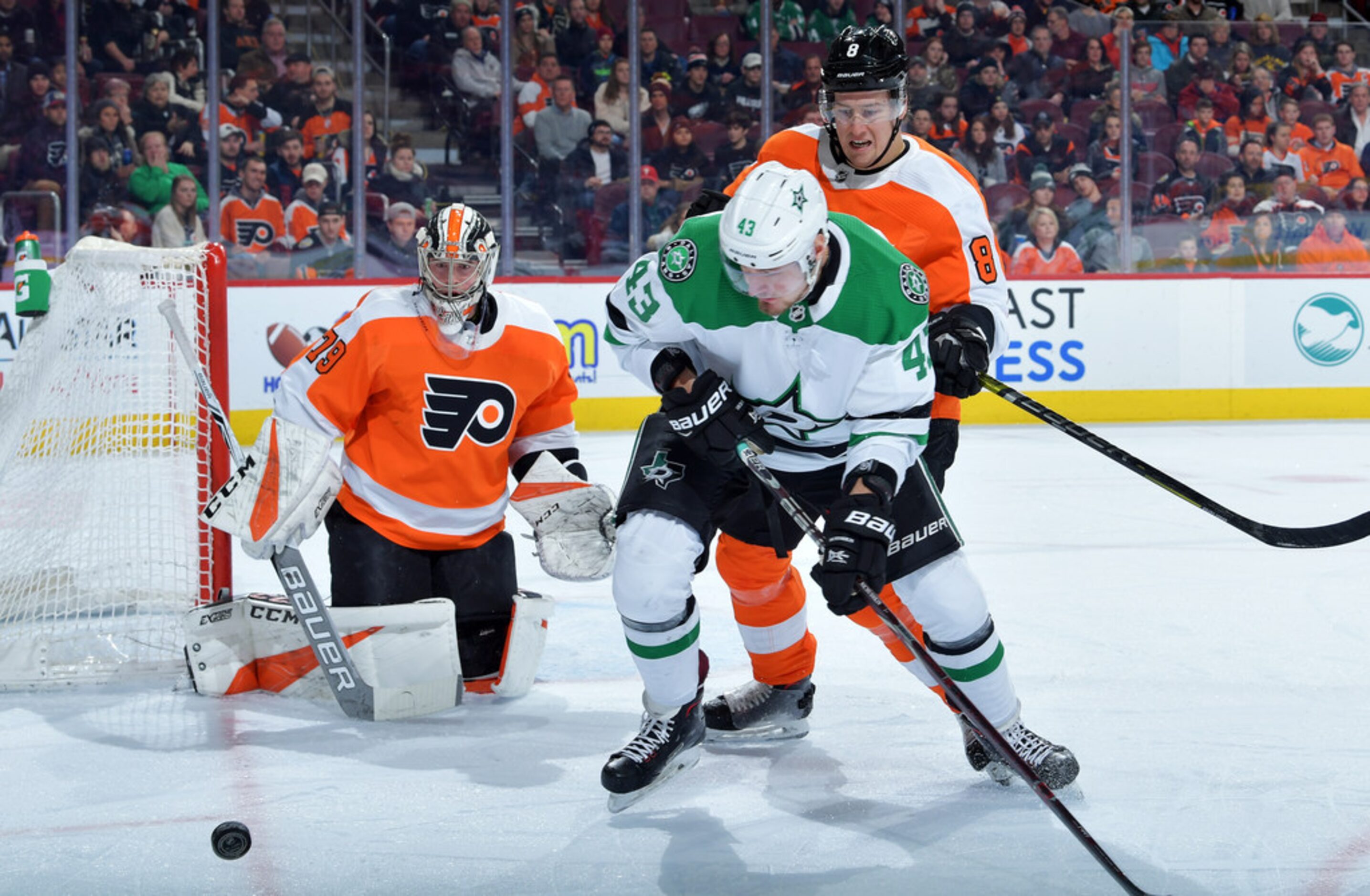 PHILADELPHIA, PENNSYLVANIA - JANUARY 10: Robert Hagg #8 of the Philadelphia Flyers checks...