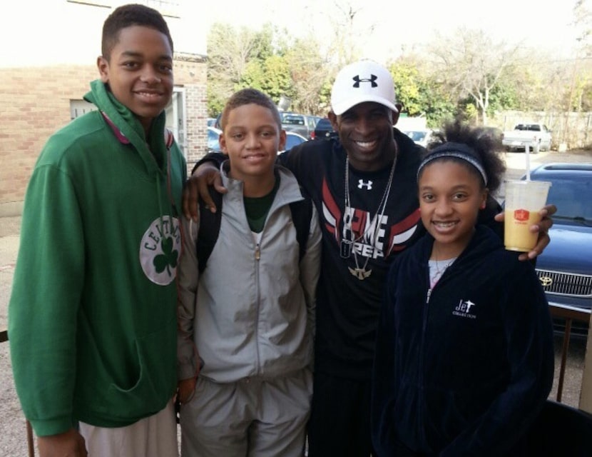 P.J. Washington (left), his brother Spencer Washington (left center) and sister Alexandria...