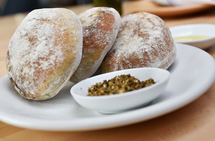 Pita bread is baked in the Israeli style — thicker and without a pocket —in the restaurant's...