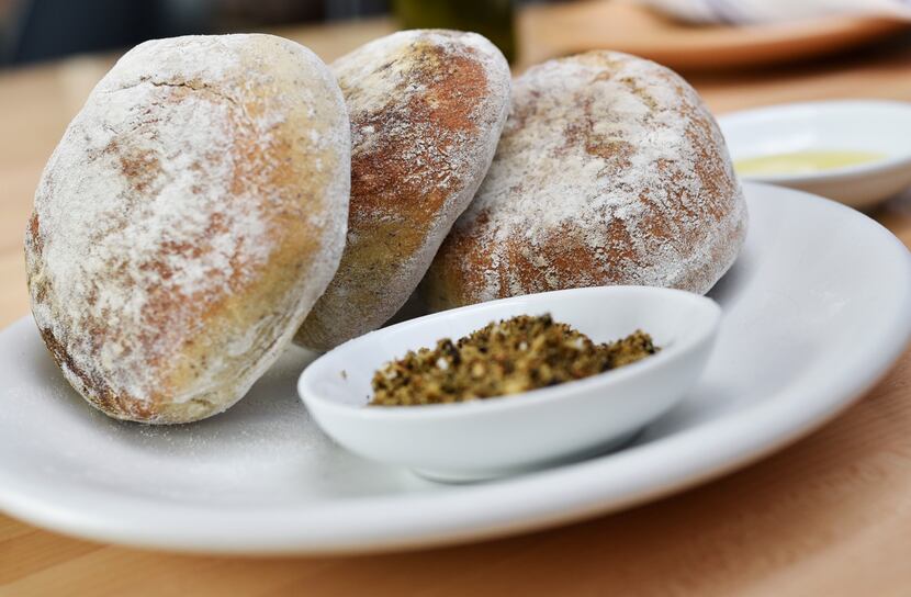 Pita bread is baked in the Israeli style — thicker and without a pocket —in the restaurant's...