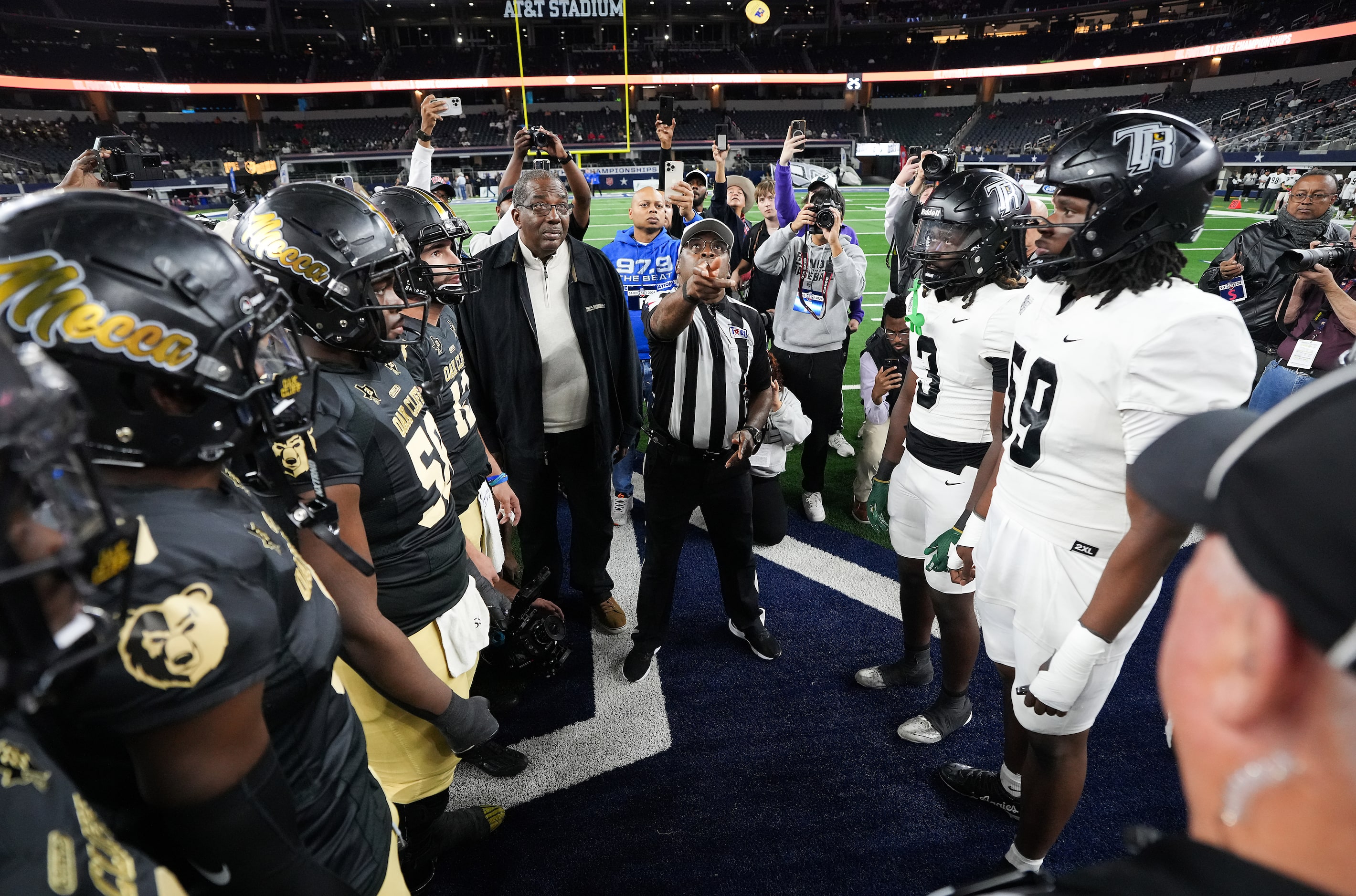 Texas Sen. Royce West watches the coin flip before the Class 5A Division II state football...