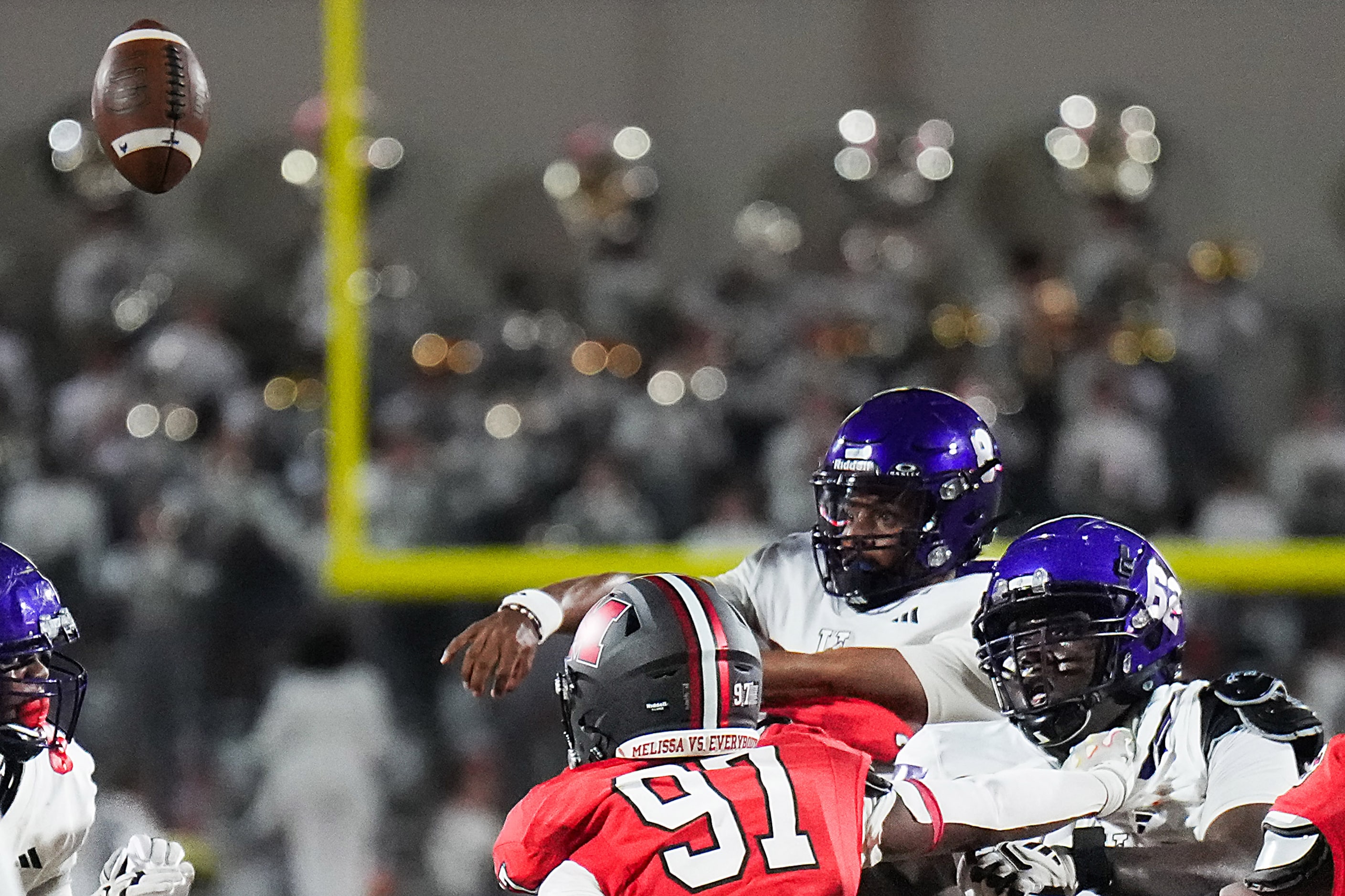 The ball gets away from Anna quarterback Ziondre Williams for a fumble that was recovered by...