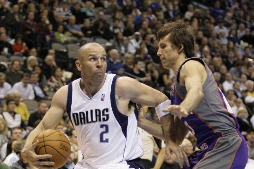 FILE - Dallas Mavericks guard Jason Kidd (left) drives against Phoenix Suns guard Steve Nash...