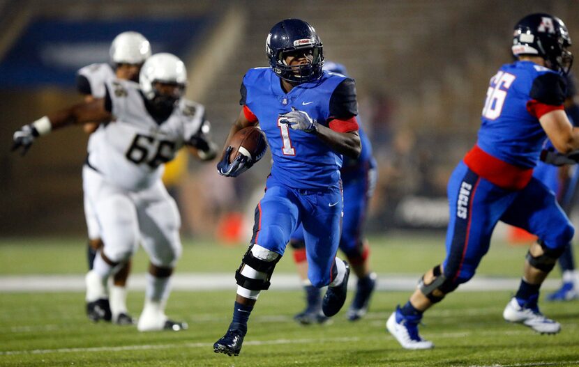 Allen running back Celdon Manning (1) breaks away from the Plano East defense for the first...