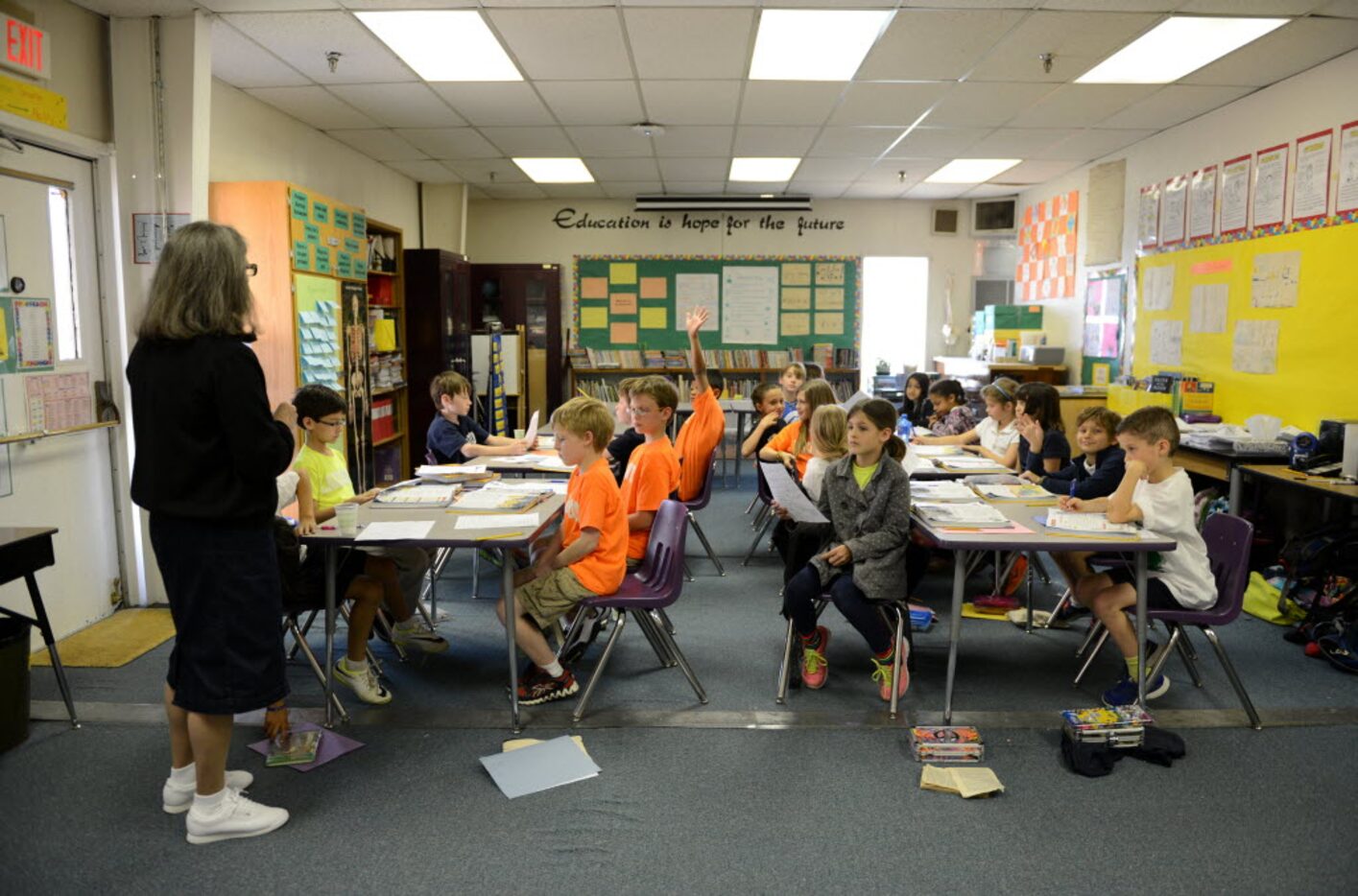 Science teacher Sharon Gillespie teaches her class in one of the portable clasrooms outside...