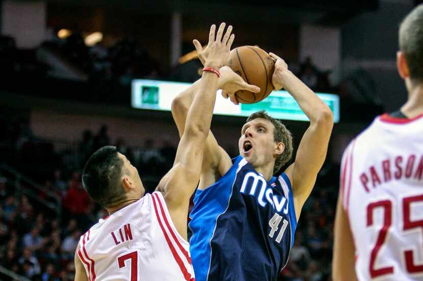 Dec 23, 2013; Houston, TX, USA; Dallas Mavericks power forward Dirk Nowitzki (41) shoots...
