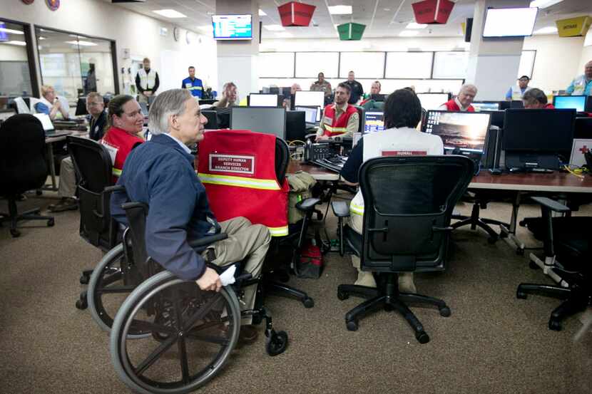  Gov. Greg Abbott visited with workers at the Texas Department of Public Safety's State...