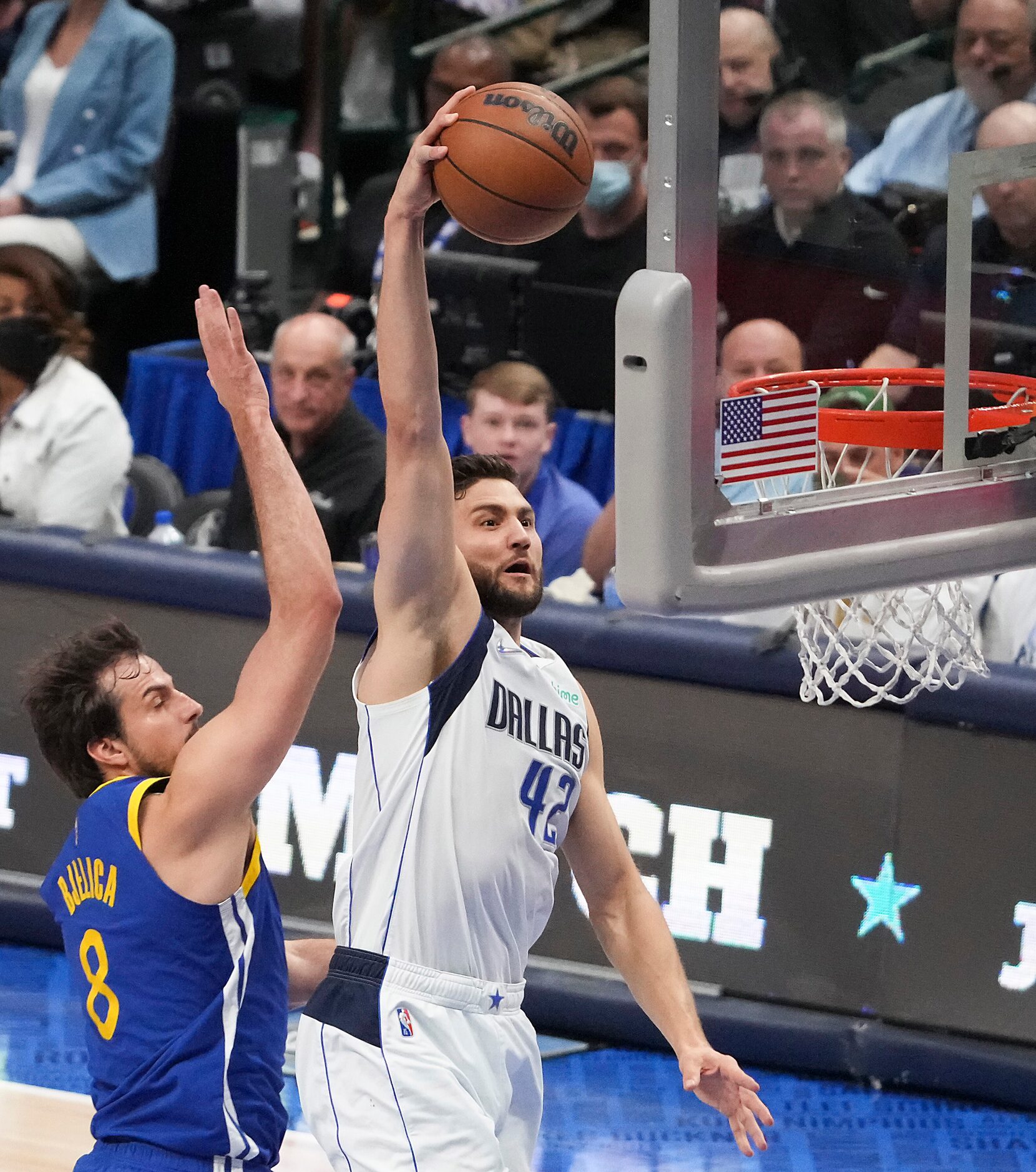 Dallas Mavericks forward Maxi Kleber (42) dunks the ball past Golden State Warriors forward...