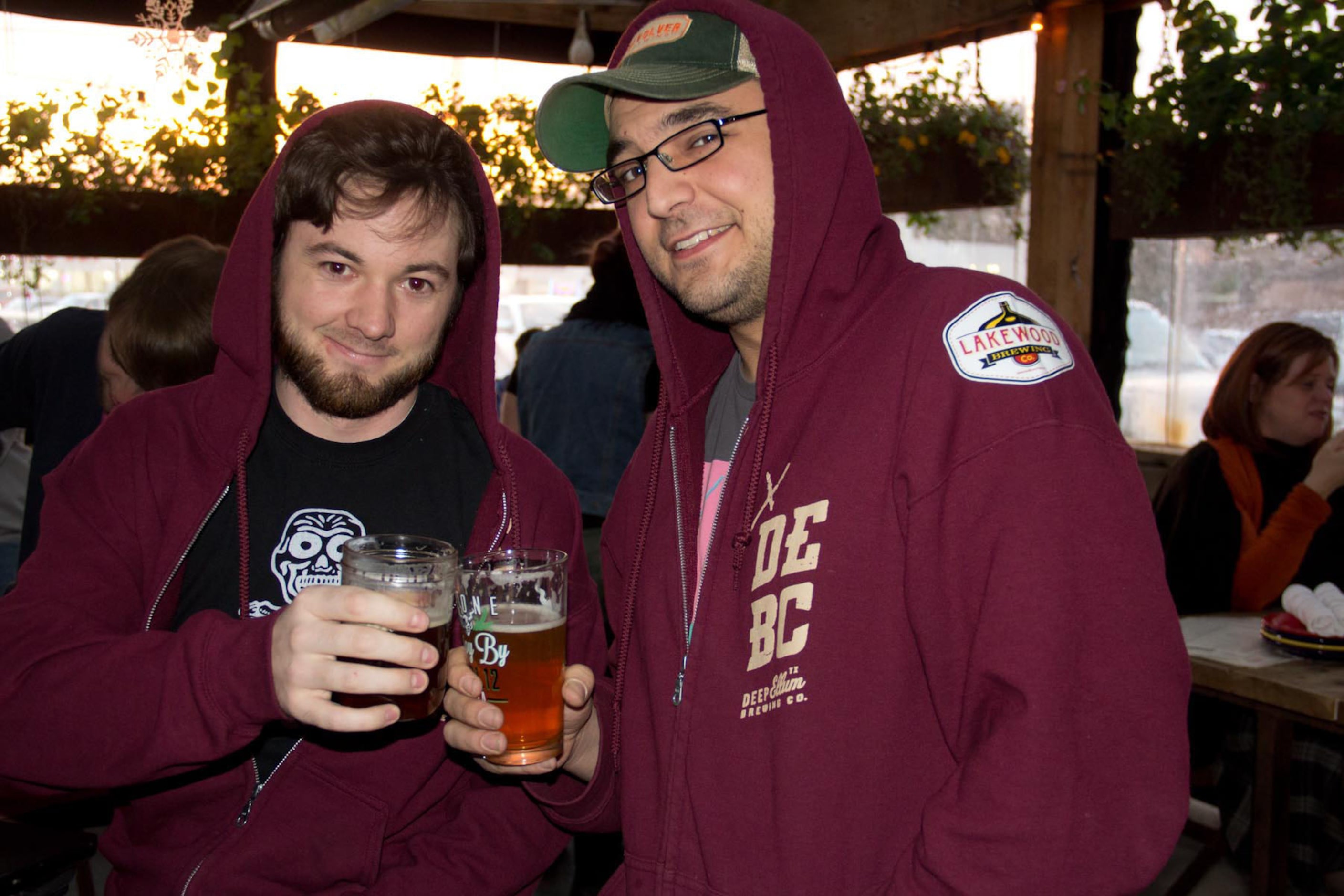 Derek Beaton and Michael Roberts enjoy tthe"Hopocalypse" brew party on 122112 in Dallas Texas.