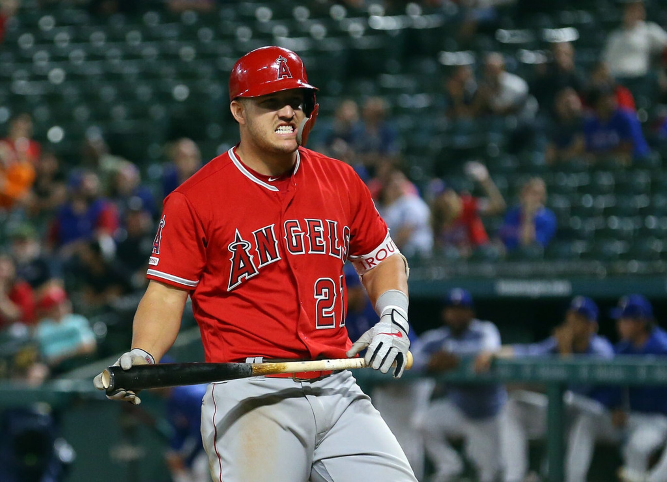 ARLINGTON, TEXAS - APRIL 17: Mike Trout #27 of the Los Angeles Angels reacts after not...