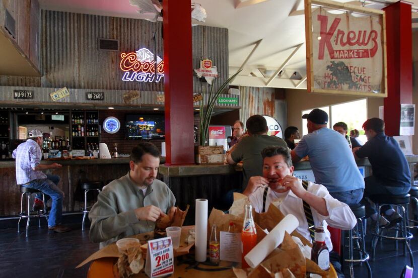 In this 2011 file photo, Jay Crutcher, left, and Don Hammett, right, eat at Lockhart...