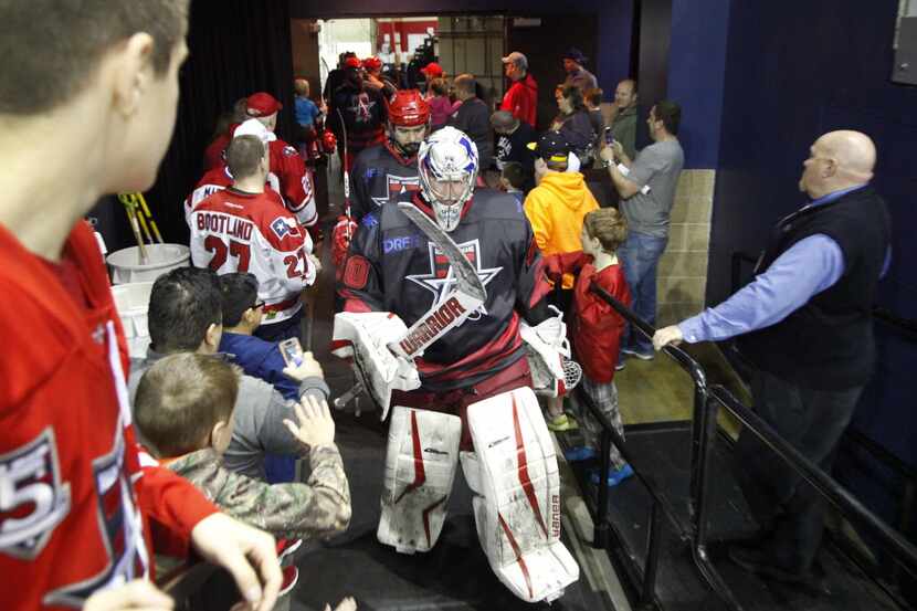 Allen Americans goal keeper Riley Gill comes out of the locker room to take the ice for the...