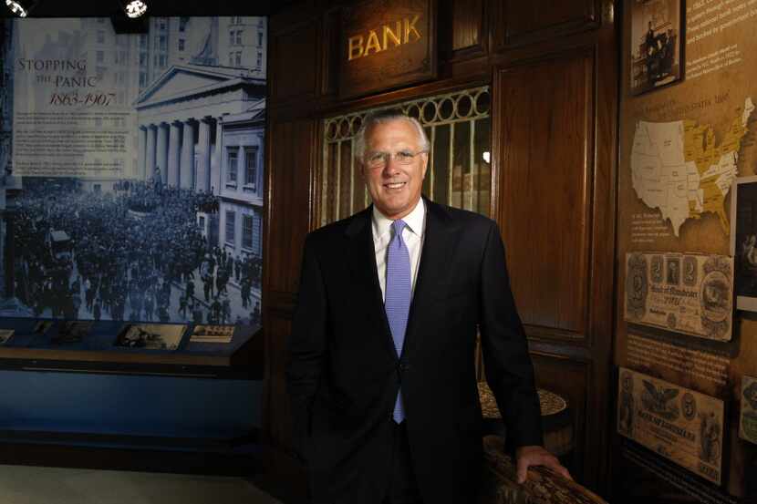  Dallas Fed president Richard Fisher in the bank's lobby. (David Woo/The Dallas Morning News)