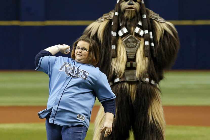ST. PETERSBURG, FL - JUNE 11: Candace Payne, known as Chewbacca Mom, throws out the first...