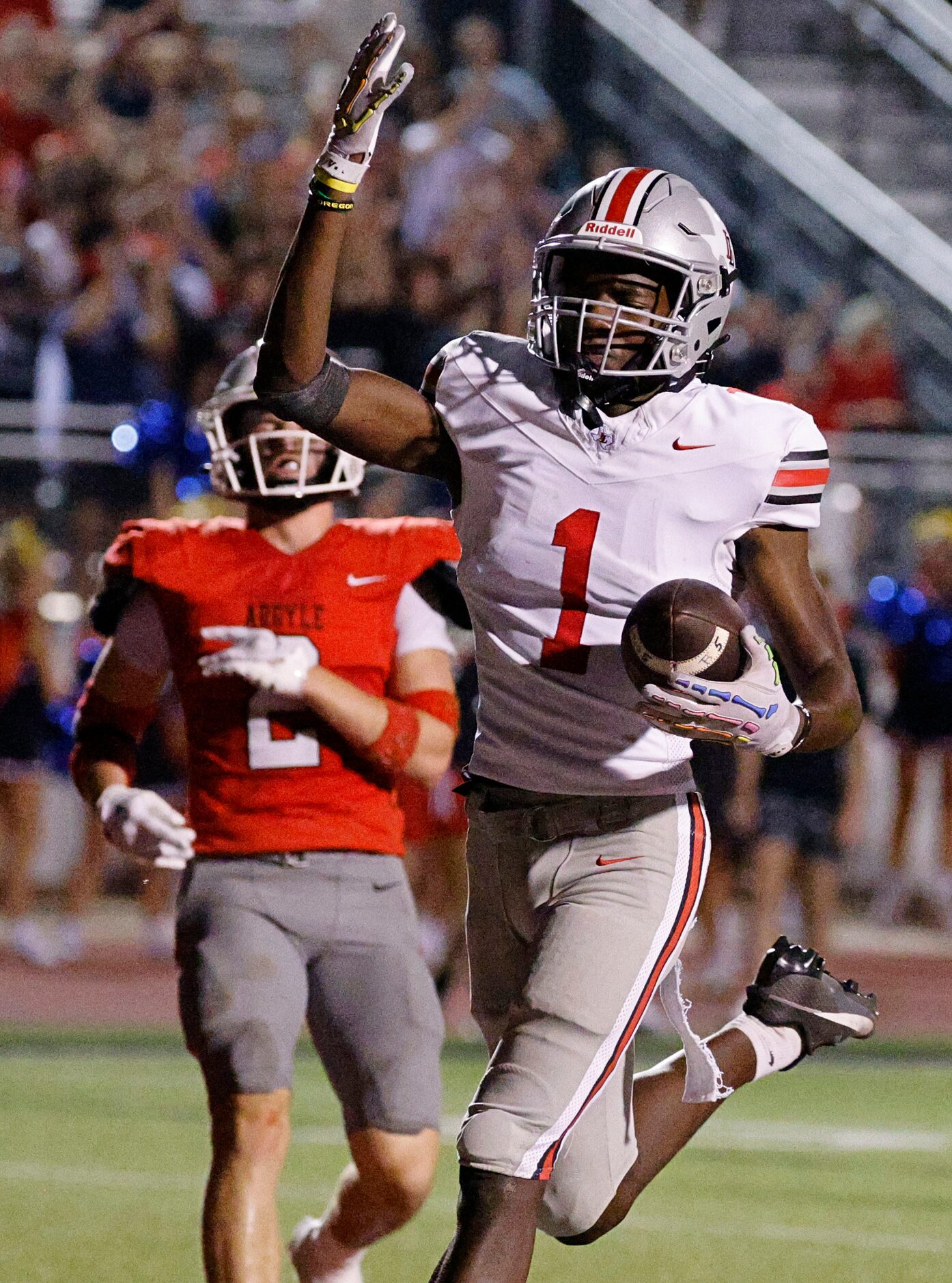 Lovejoy's Jalen Lott (1) runs into the end zone for a touchdown as Argyle's Garrett Westrom...