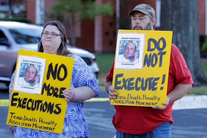 Jennifer Martin (left) and Thomas Roberson, younger brother of condemned prisoner Robert...